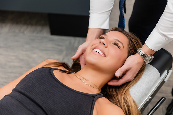 Dr. Jacob Henricksen treating patients neck pain