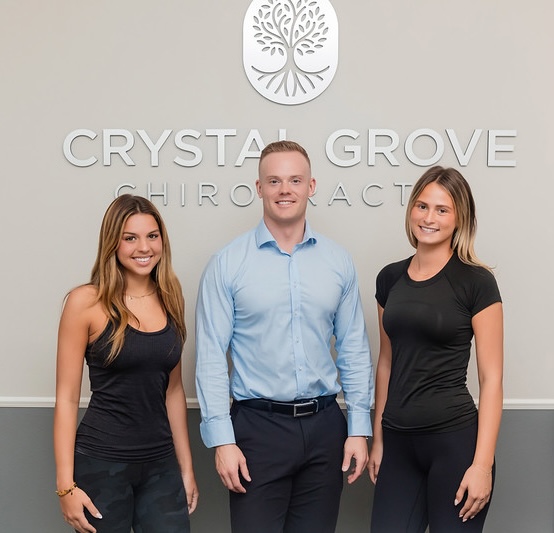 Dr. Jacob Henricksen with two female staff