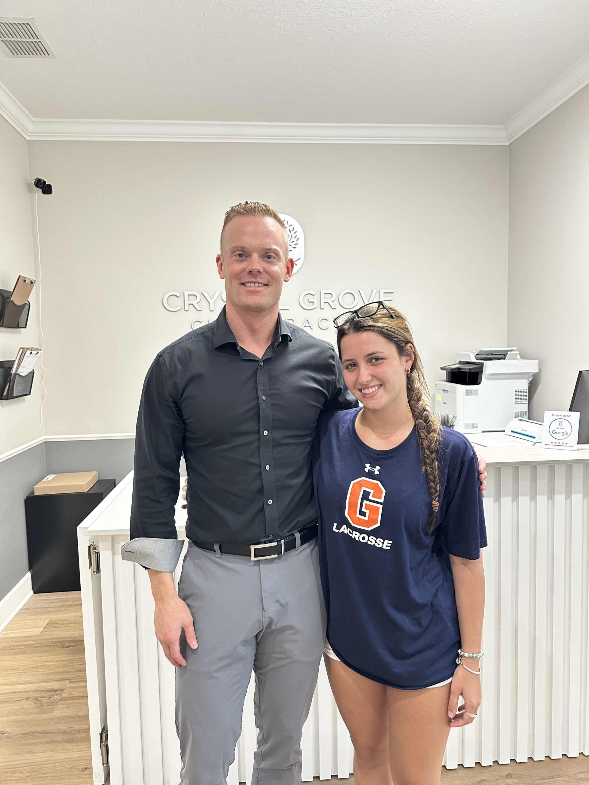 Dr. Jacob Henricksen taking photo together with a patient