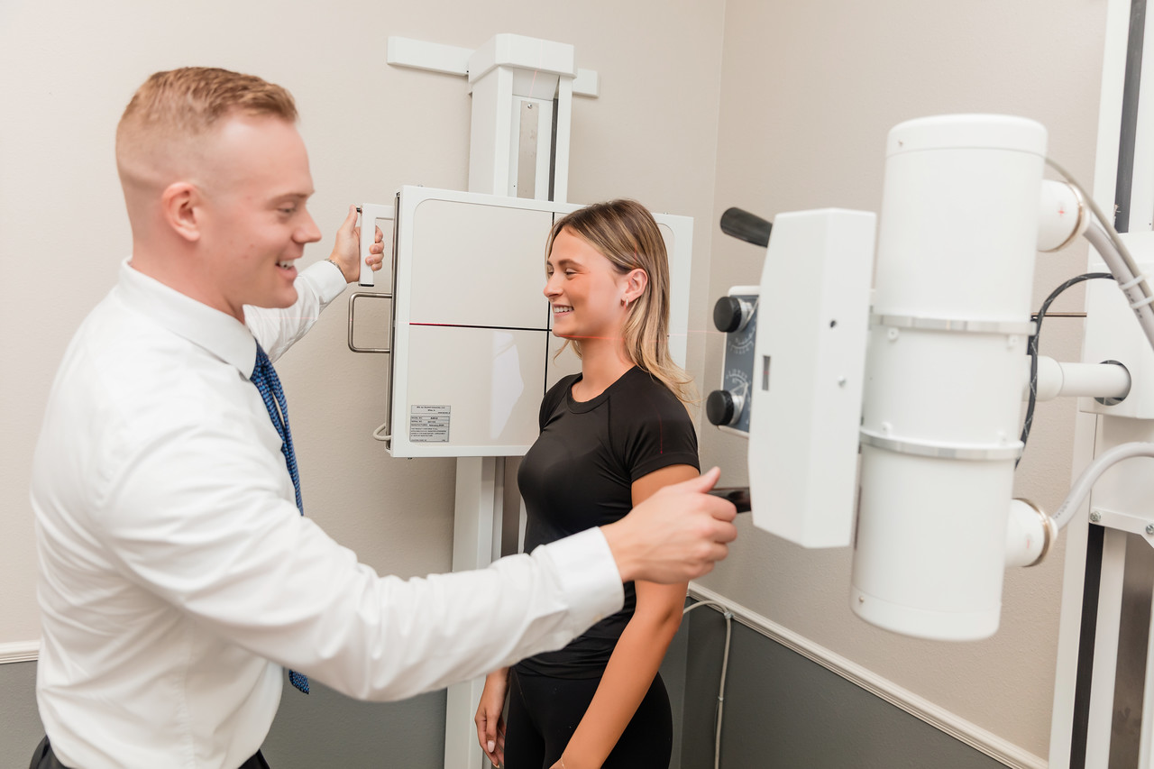 Dr. Jacob Henricksen doing spine xray in patient